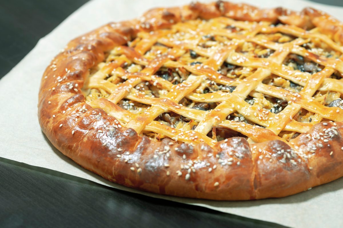 crostata salata con zucchine speck AdobeStock 429272526