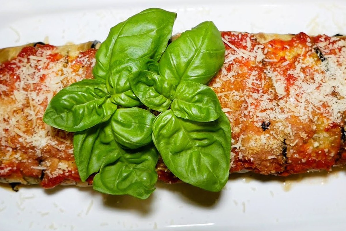 arrotola le melanzane farciscile con arrotola le melanzane e aggiungi rotolo di melanzane.1